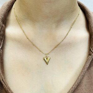 Golden Muse Heart Pendant