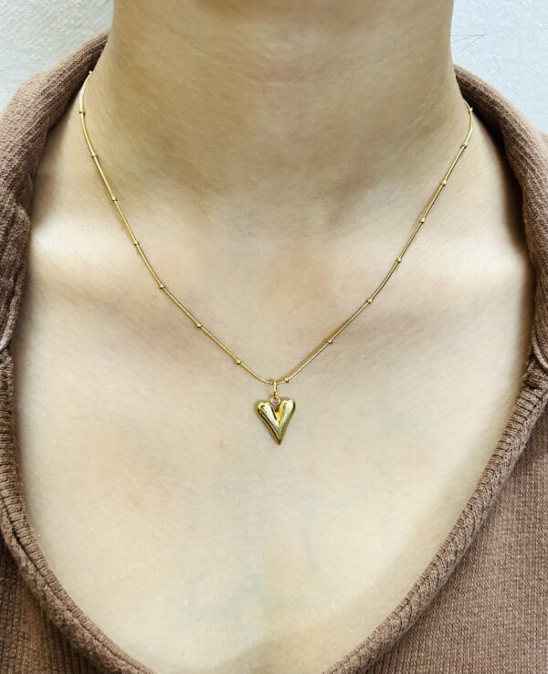 Golden Muse Heart Pendant